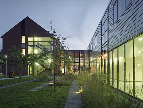 Installation of stainless steel siding tiles on Morken Center for Learning and Technology at Pacific Lutheran University